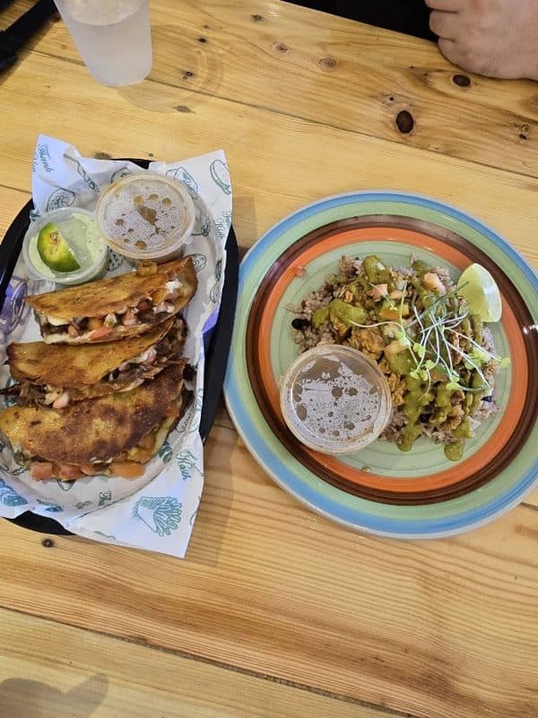 Khris_EXQ-16's photo of birria tacos and dirty rice